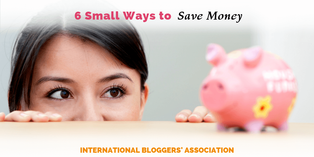 woman peeking at piggy bank on table with text overlay "6 small ways to save money"