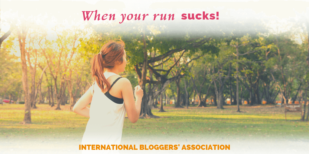 woman running in a park with text overlay "When Your Run Sucks"